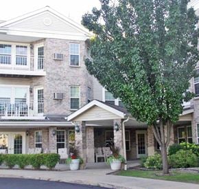Cedarburg apartment for rent - a house with a tree in front of it