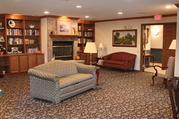 Cedarburg apartment for rent - a living room with furniture and a fireplace