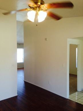 Lanacaster house for rent - A room with a ceiling fan and a door.