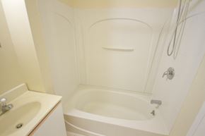 Camden apartment for rent - bathroom with white cabinets