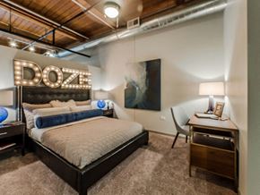 Chicago apartment for rent - a bedroom with a bed and a desk
