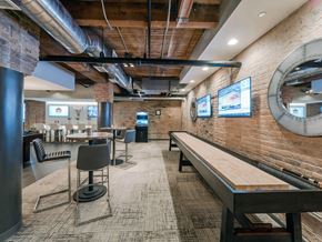 Chicago apartment for rent - Chicago luxury apartment game room amenity with shuffle board