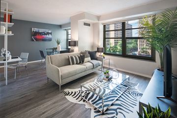 Chicago apartment for rent - a living room with a couch and a coffee table