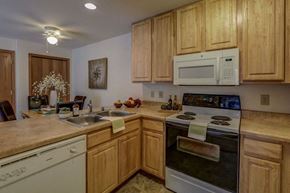 Middleton apartment for rent - a kitchen with a stove microwave and a sink