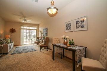 Sun Prairie apartment for rent - a living room with a couch and a table