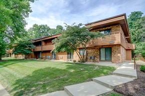 Middleton apartment for rent - a house with a lawn and trees in front of it