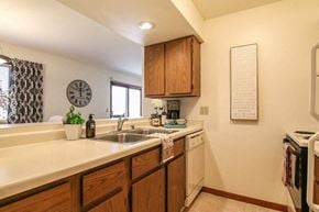 Middleton apartment for rent - a kitchen with a sink and a dishwasher