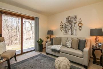 Middleton apartment for rent - a living room with a couch and a window