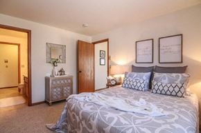 Middleton apartment for rent - a bedroom with a bed and a door to a bathroom