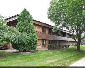 Madison apartment for rent - a house with a yard and trees in front of it