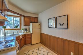 Maple Bluff apartment for rent - a kitchen with a stove and a refrigerator