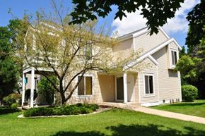 Madison apartment for rent - a white house with a tree in front of it