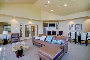 Sun Prairie apartment for rent - a living room with a couch and a table