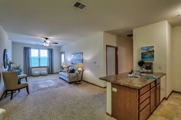 Madison apartment for rent - a living room with a kitchen and a couch