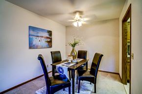Middleton apartment for rent - a dining room with a table and chairs