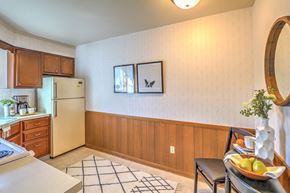 Monona apartment for rent - a kitchen with a sink and a refrigerator