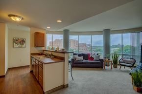 Madison apartment for rent - a kitchen and living room with a view of the city