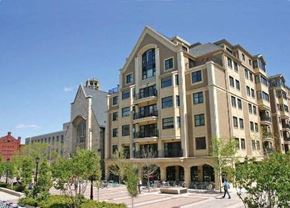 Madison apartment for rent - a large building with people walking in front of it