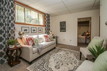 Madison apartment for rent - a living room with a couch and a rug