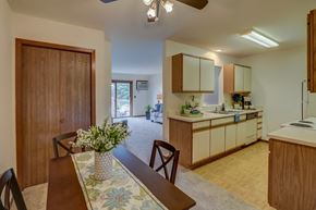 Madison apartment for rent - a kitchen and dining room with a table and chairs