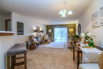 Fitchburg apartment for rent - a living room with a couch and a table