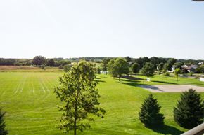 Madison apartment for rent - a view of a park from a balcony overlooking a field