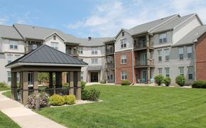 Madison apartment for rent - an apartment building with a gazebo and a lawn