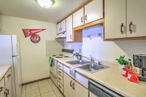 Madison apartment for rent - a kitchen with a sink and a stove and a refrigerator