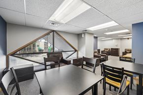 Madison apartment for rent - A conference room with a long table and chairs.