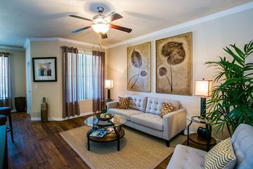 Mesa apartment for rent - a living room with a couch and a ceiling fan