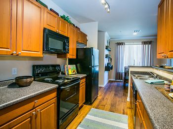 Waterford apartments full kitchen with microwave