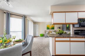 Louisville apartment for rent - Open floor plan with view of kitchen, dining area, and living room
