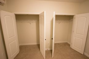Newark apartment for rent - Bedroom with two closets and carpeted floors