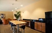 Colonia apartment for rent - a kitchen and dining room with a table and chairs