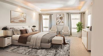 Baltimore apartment for rent - A modern bedroom with a large bed and a chair.