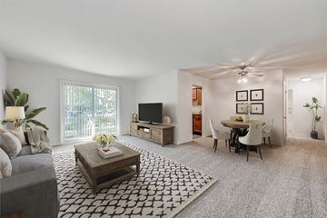 Annapolis apartment for rent - a living room with a couch and a table and a tv