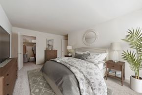 Annapolis apartment for rent - a bedroom with a large bed and a tv