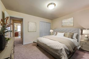 Glen Burnie apartment for rent - a bedroom with a bed and a door to a bathroom