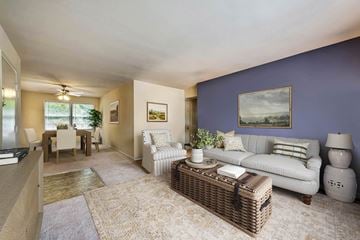 Glen Burnie apartment for rent - a living room with a couch and a table