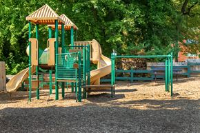 Woodbridge apartment for rent - a playground with a slide and other playground equipment
