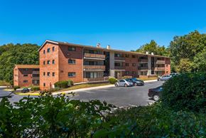 Bladensburg apartment for rent - a large brick building with cars parked in front of it