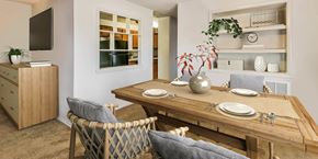 Alexandria apartment for rent - a dining room with a wooden table and chairs