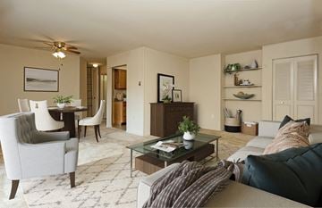 Lanham apartment for rent - a living room with a couch and a table