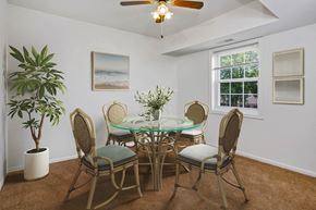 Cockeysville apartment for rent - a dining room with a table and chairs