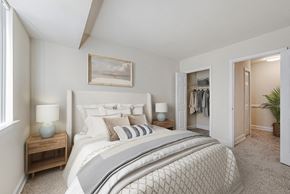Bladensburg apartment for rent - a bedroom with a bed and a closet