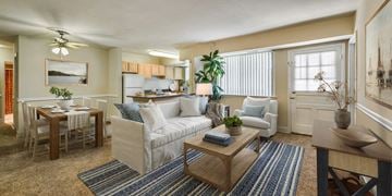 Bladensburg apartment for rent - a living room with a couch and a table