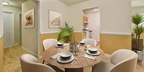 Hyattsville apartment for rent - a dining room with a table and chairs