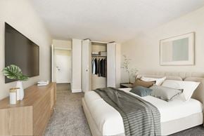 Baltimore apartment for rent - a bedroom with a large bed and a tv