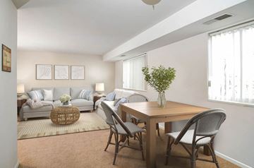 Dundalk apartment for rent - a living room and dining room with a couch and a table