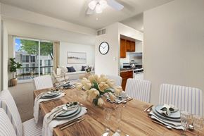 Greenbelt apartment for rent - a dining room with a wooden table and chairs
